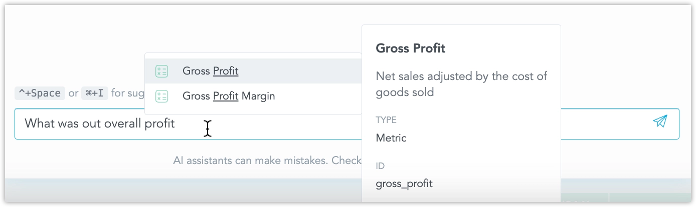 Screenshot of the assistant showing the 'What was our total profit' typed in the input field and an autocompletion dialog showing profit related metrics popping up.